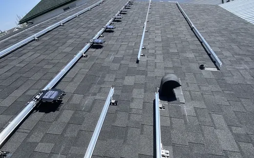 Solar racking across multiple roof planes